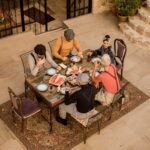 A group enjoying a traditional Turkish breakfast outdoors in Ürgüp, Türkiye.