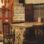 Charming interior of a Valencia cafe with traditional Spanish tile decor.
