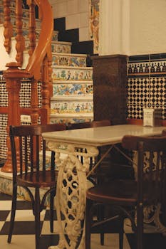 Charming interior of a Valencia cafe with traditional Spanish tile decor.
